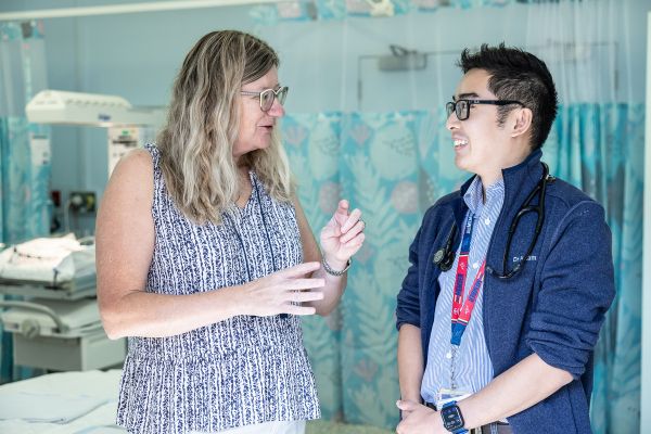 Home Dr Conway and Dr Lam conversing