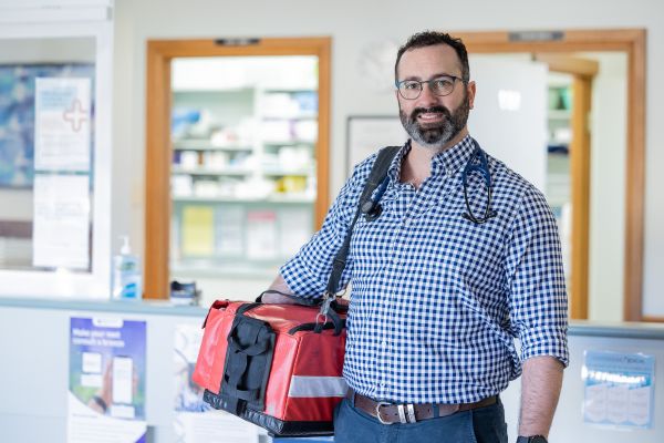 Dr MacPherson with doctors bag
